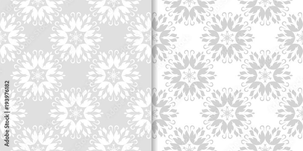 Light gray set of floral seamless patterns Light gray set of floral seamless patterns