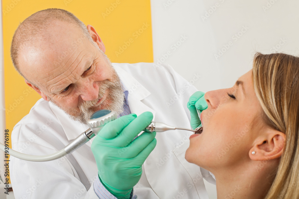 Dental cleaning with air flow Dental cleaning with air flow