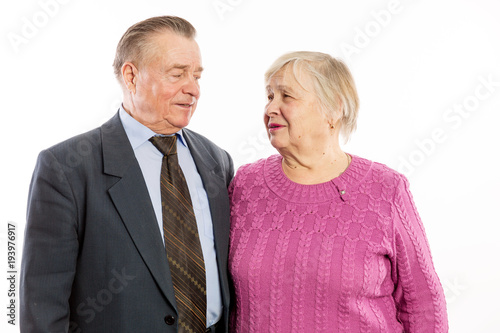 Mature couple hugs and smiles