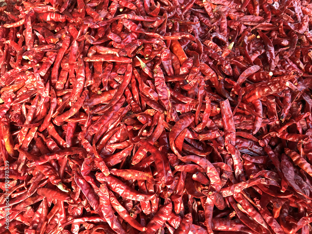 Fototapeta premium Red peperoni peppers. Natural texture and background.