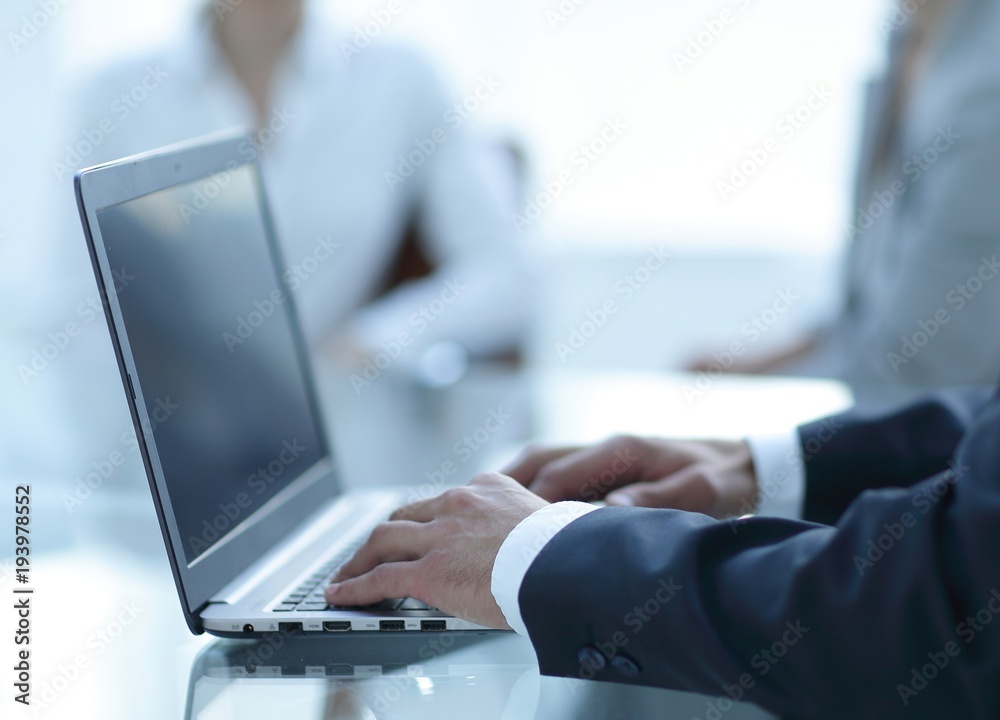 closeup of businessman typing on laptop. closeup of businessman typing on laptop.