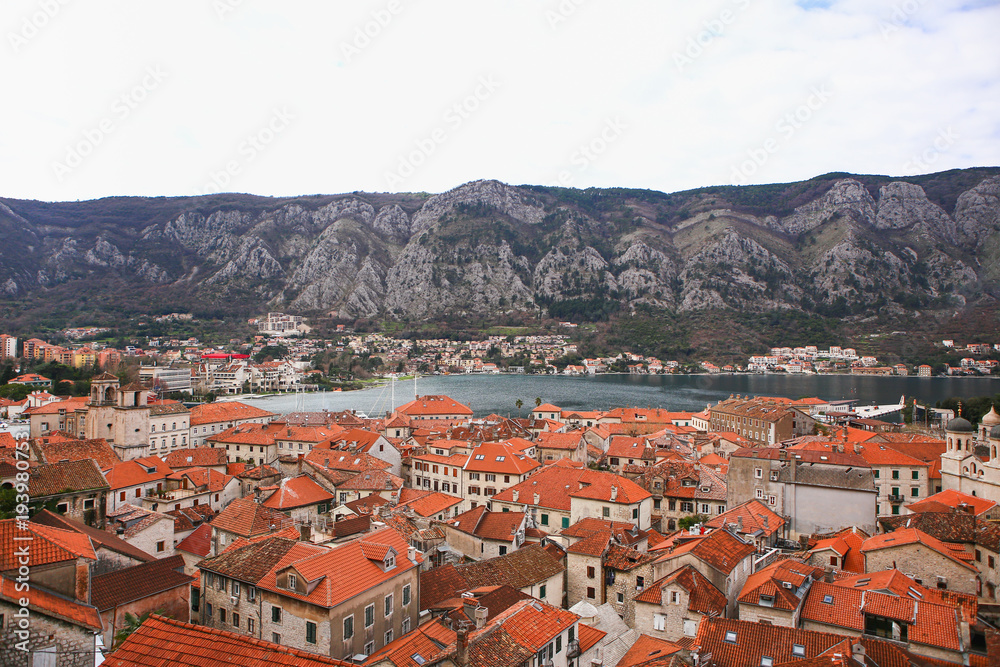 Orange roofs of a medieval city. Top view.