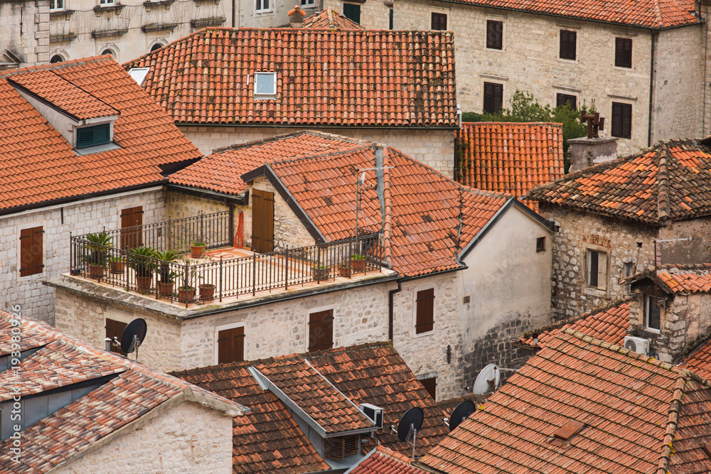 Orange roofs of a medieval city. Top view.