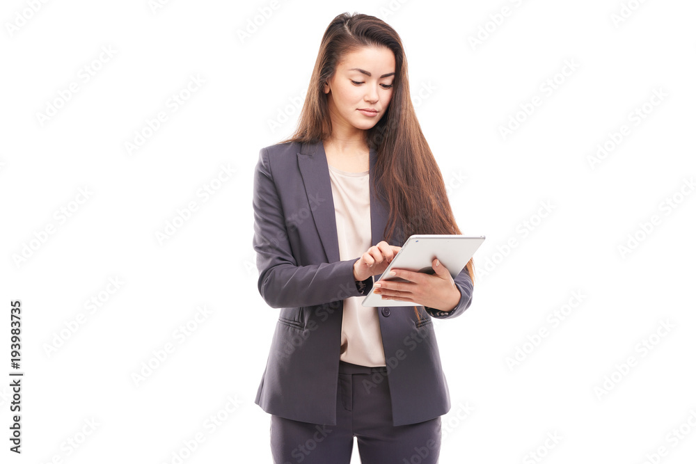 Isolated portrait of young Asian businesswoman holding tablet computer Isolated portrait of young Asian businesswoman holding tablet computer