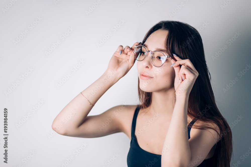 Young beautiful business woman in glasses Young beautiful business woman in glasses