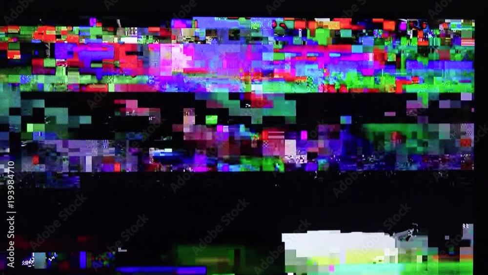 Digital TV glitch on television screen with misplaced squares, static effects and freezing problems during broadcast failure