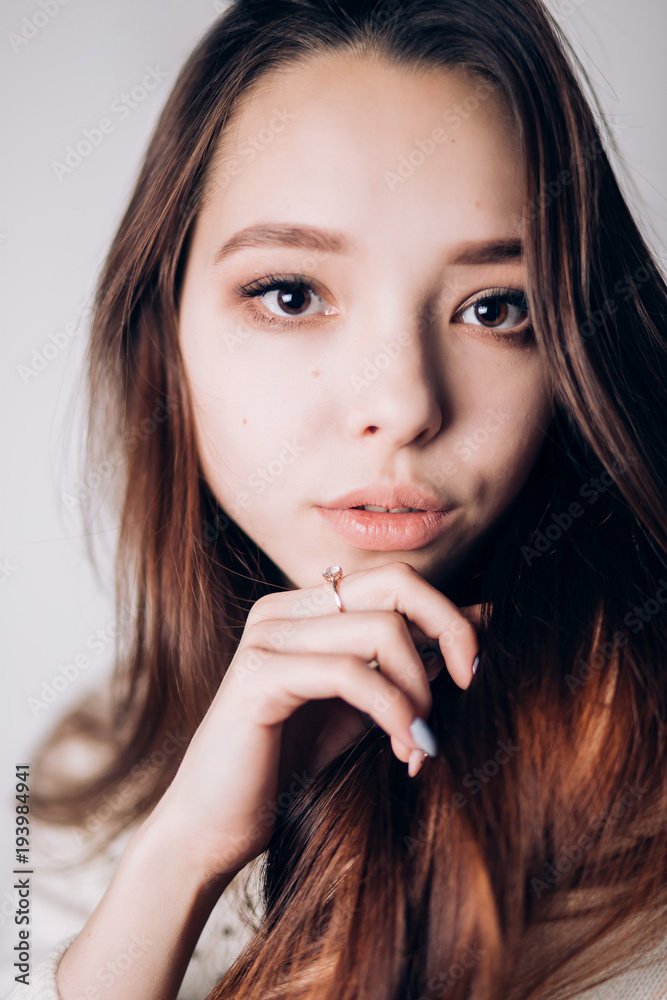 Close up portrait of a serious brunette woman. Sexy girl Close up portrait of a serious brunette woman. Sexy girl