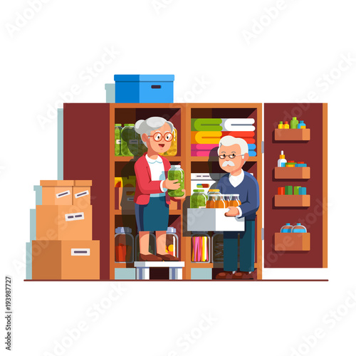 Retired family couple working at home pantry