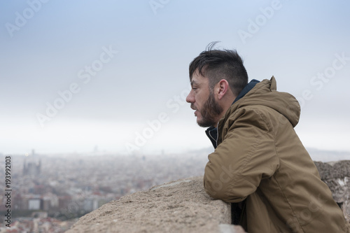 Man with Barcelona view