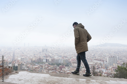 Man with Barcelona view