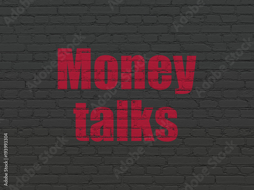 Business concept: Painted red text Money Talks on Black Brick wall background © Maksim Kabakou