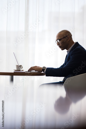 Office worker using laptop at office
