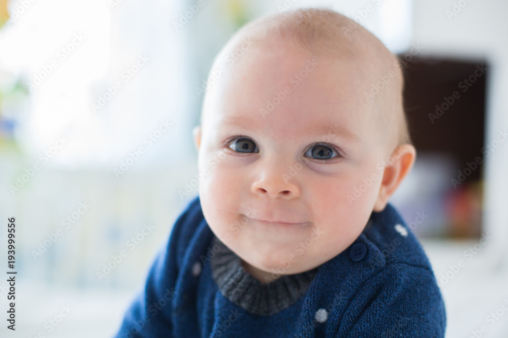 Portrait of a cute  infant baby boy. Happy childhood concept.