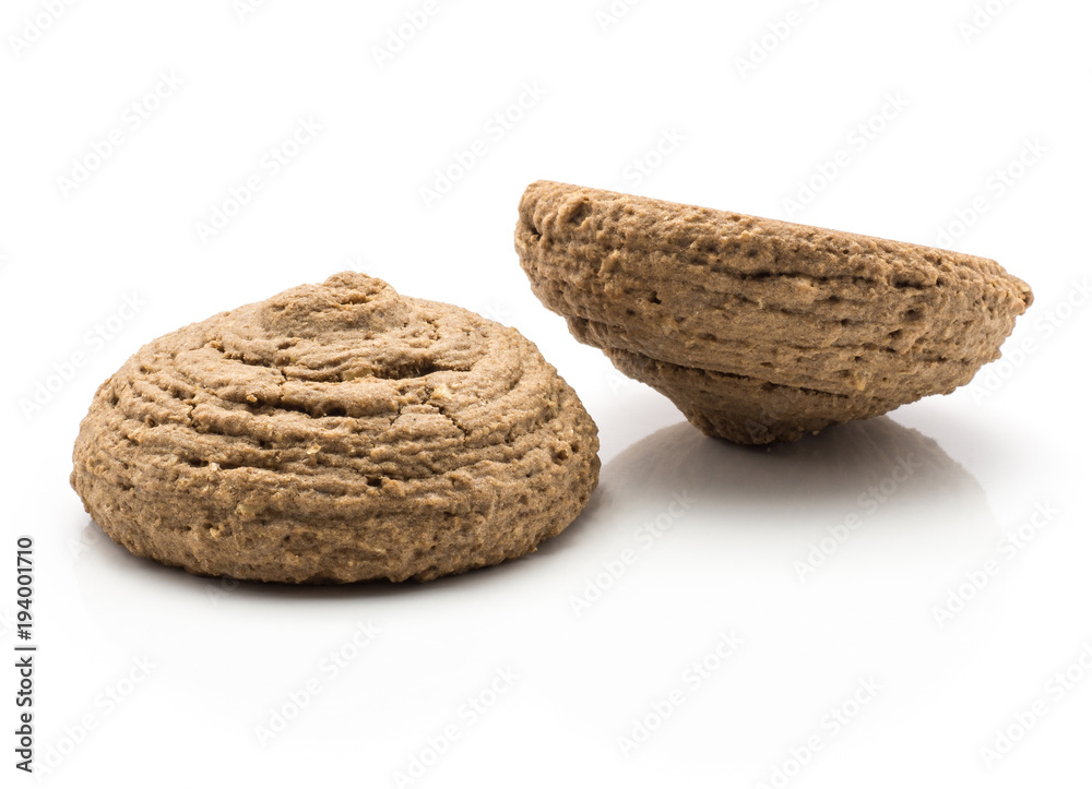 Cocoa oat cookies two drop shape brown crispy biscuits isolated on white background. Cocoa oat cookies two drop shape brown crispy biscuits isolated on white background.