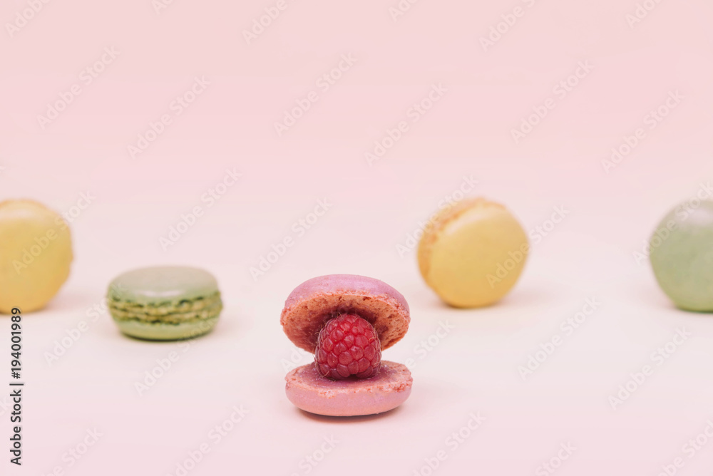 French macaroon cake macaroons as a shell with raspberry pearl. French macaroon cake macaroons as a shell with raspberry pearl.