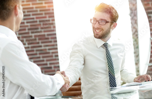 handshake business partners after the deal
