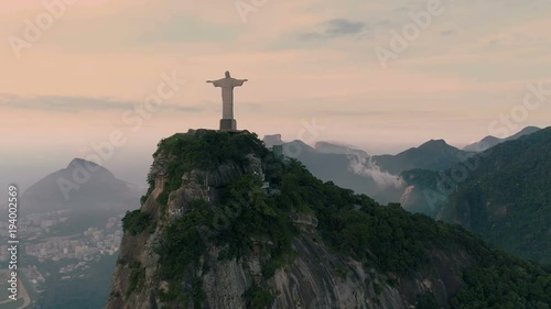 Aerial View Of Christ The Redeemer Statue at sunrise. Rio de Janeiro, Brazil