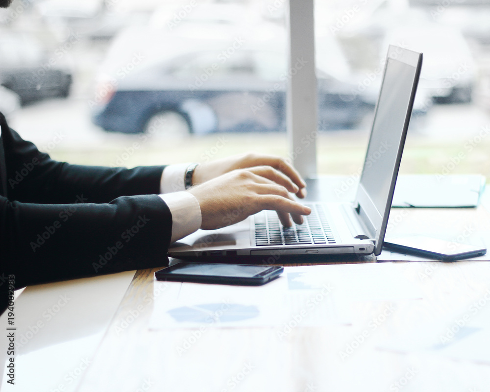 businessman typing on laptop.people and technology businessman typing on laptop.people and technology