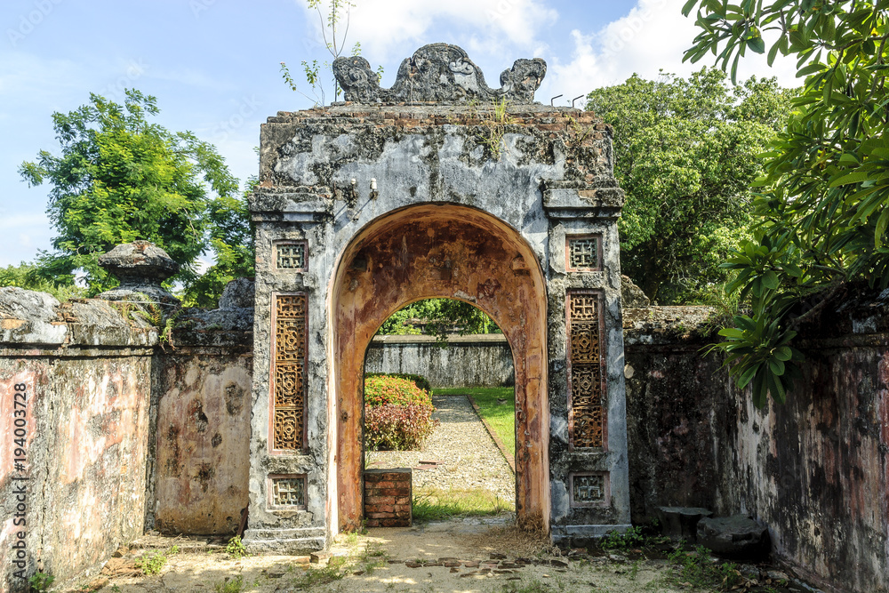 door in the imperial Hue citadel, patrimony of the humanity, in Vietnam.