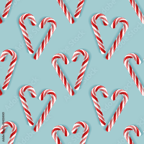 Seamless pattern with candy cane hearts