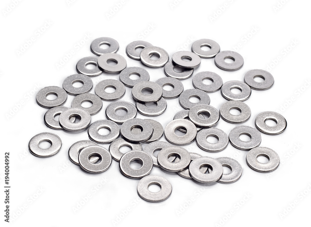 flat washers for fasteners, on a white background isolated flat washers for fasteners, on a white background isolated