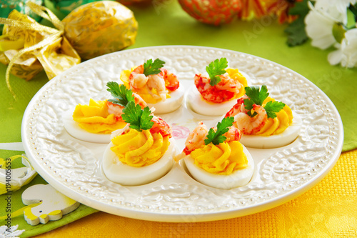 Eggs stuffed with creamy mousse and crayfish.