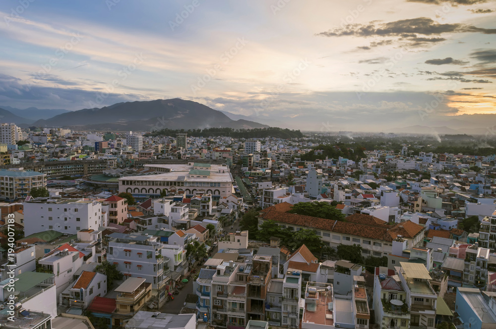 view of the city at sunset from a bird's eye view