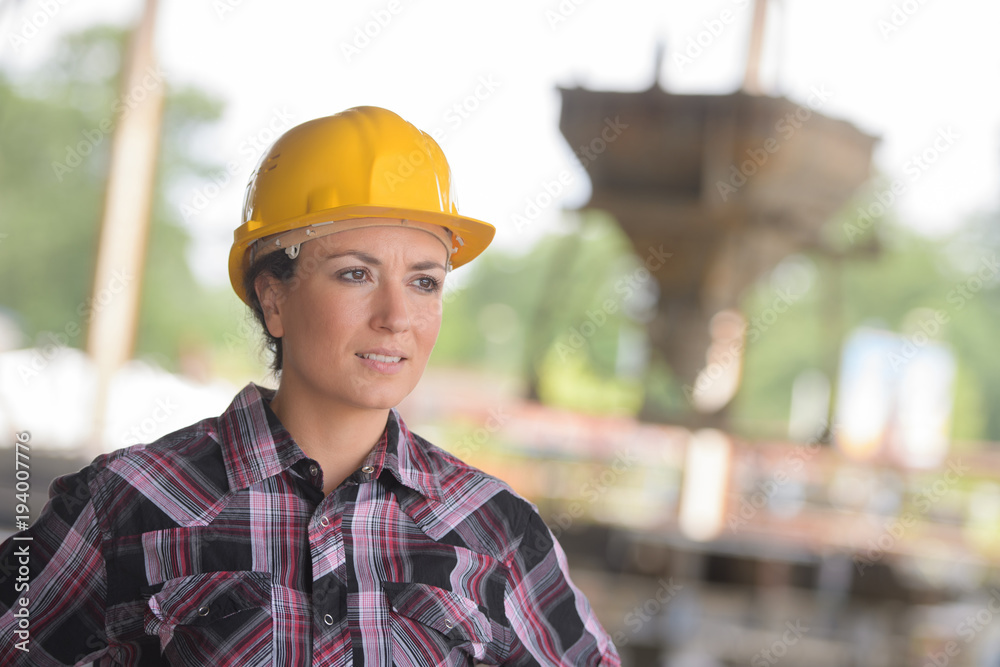 Portrait of woman in hardhat Portrait of woman in hardhat