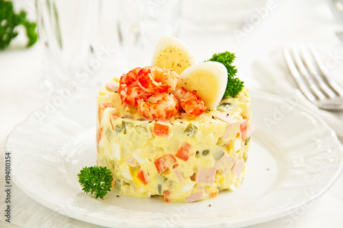Salad "Olivier" with crayfish and caviar.