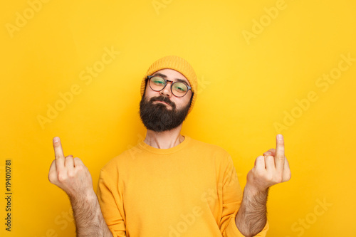 Fotografiet Ignorant man showing obscene gesture