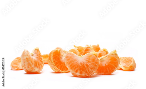 Mandarin orange citrus fruit slice isolated on white