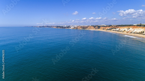 Fototapeta Naklejka Na Ścianę i Meble -  Aerial rocks and cliffs seascape shore view of famous Falesia beach, Algarve.