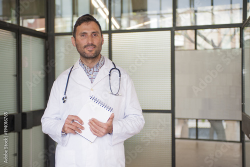 handsome doctor in a medical center photo