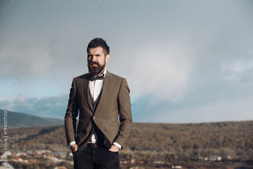 Man with beard and mustache with scenery on background. Man with beard and mustache with scenery on background.
