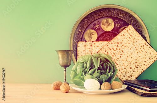 Pesah celebration concept  jewish Passover holiday . Traditional book with text in hebrew  Passover Haggadah  Passover Tale .