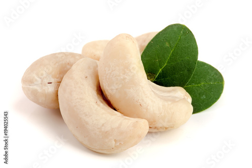 cashew nuts with leaf isolated on white background. macro