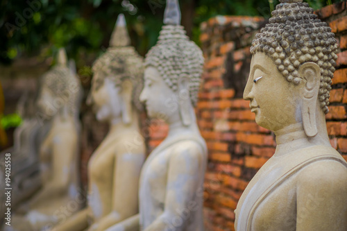 Close up of selective focus Ancient Buddha Statue at WAT YAI CHAI MONGKOL  The Historic City of Ayutthaya  Thailand