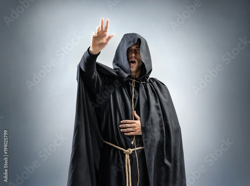 Fototapeta Catholic monk is preaching