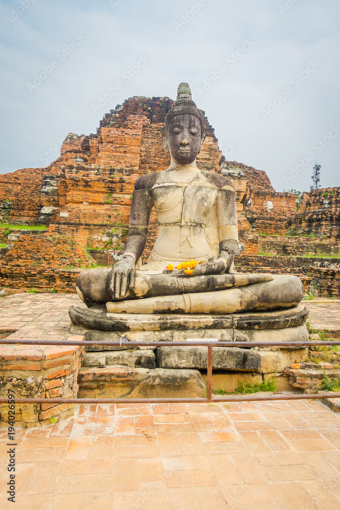 Beautiful outdoor view of the ancient budha at Ayutthaya Historical Park in the ruins of the old city Beautiful outdoor view of the ancient budha at Ayutthaya Historical Park in the ruins of the old city