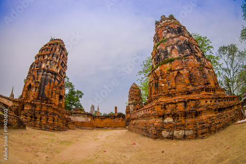 Beautiful outdoor view of Wat Pra Si Sanphet is part of the Ayutthaya historikal park. It was the holiest temple of the city until it was destroyed by the Burmese armies in year 1767 photo