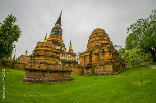 Outdoor view of domes at Wat Pra Si Sanphet is part of the Ayutthaya historikal park. It was the holiest temple of the city until it was destroyed by the Burmese armies in year 1767 photo