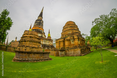 Outdoor view of domes at Wat Pra Si Sanphet is part of the Ayutthaya historikal park. It was the holiest temple of the city until it was destroyed by the Burmese armies in year 1767 photo
