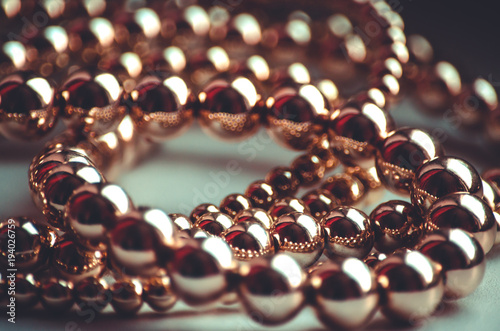 Fototapeta Golden beads valuable necklace