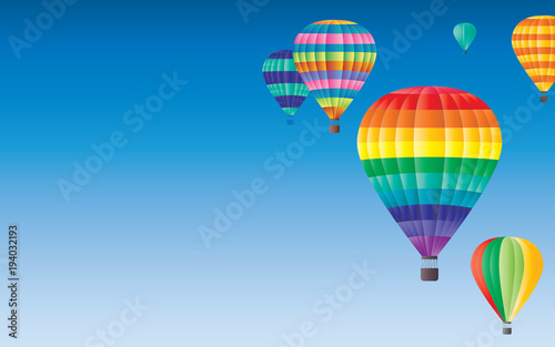 Hot air balloons flying on clearly blue sky background. Available for tour text. Festival, holiday, explore, travel, journey concept.