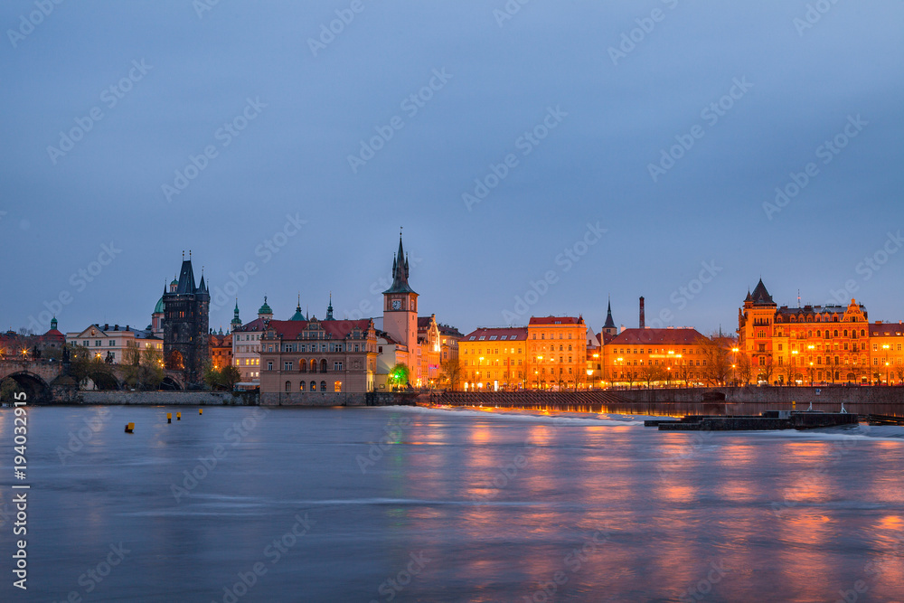 View of night old town of Prague and with reflection in Vltava River