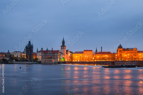 View of night old town of Prague and with reflection in Vltava River