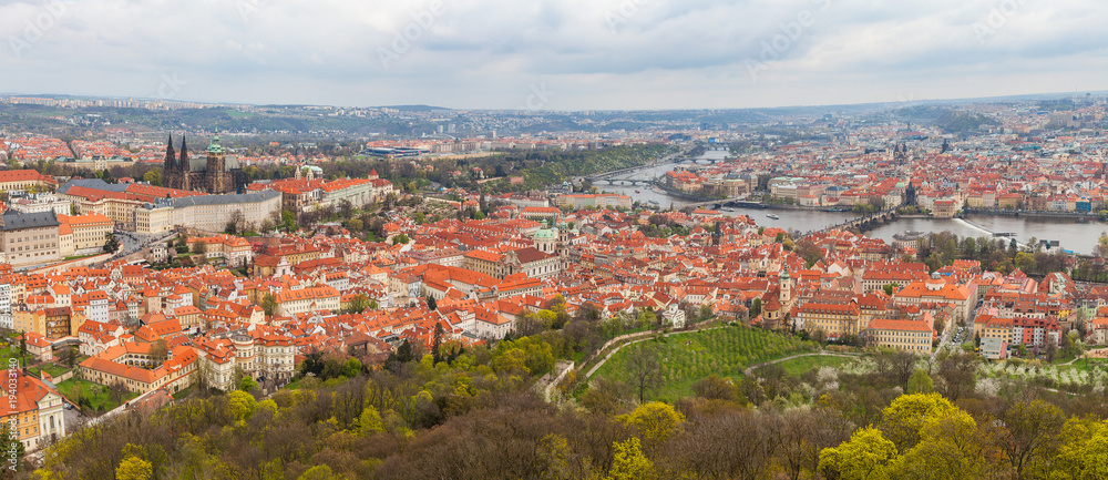 Wide panoramic view of old town with tiled roofs, Prague, Czech Republic Wide panoramic view of old town with tiled roofs, Prague, Czech Republic