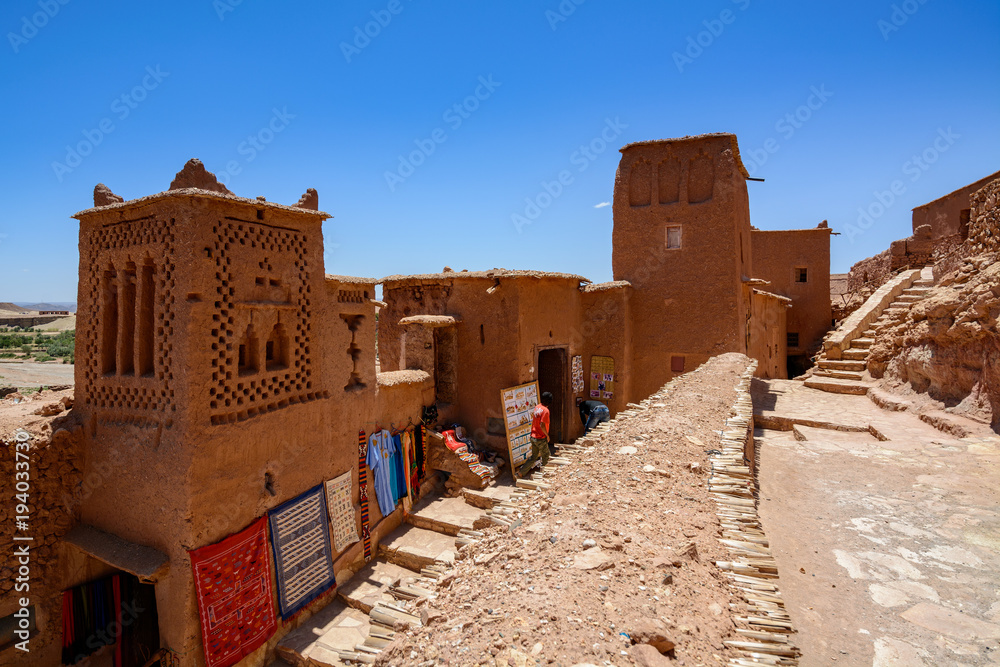 Ait Ben Haddou or Ait Benhaddou is a fortified city along the former caravan route between the Sahara and Marrakech city in Morocco Ait Ben Haddou or Ait Benhaddou is a fortified city along the former caravan route between the Sahara and Marrakech city in Morocco