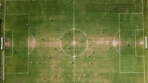 Top down aerial footage of an amateurs soccer match