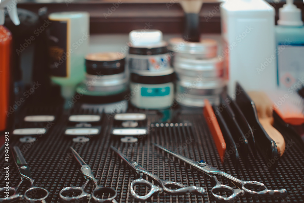 Professional hairdresser set for men on table. Soft focus. Professional hairdresser set for men on table. Soft focus.